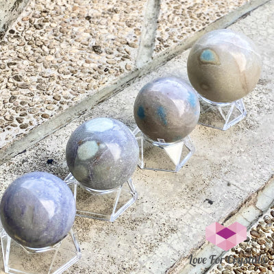 Trolleite Quartz Crystal Sphere (Brazil) Rare