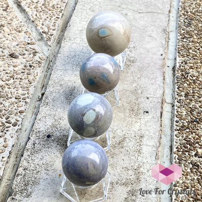 Trolleite Quartz Crystal Sphere (Brazil) Rare