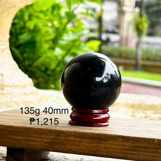 Black Tourmaline Sphere (Brazil) with wooden stand